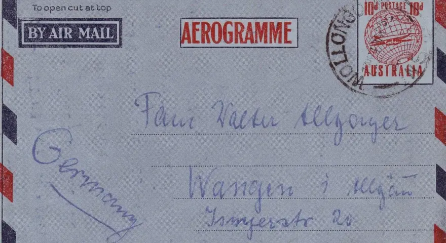 Aerogram z Niemiec do Australii. Na kopercie widnieje skrót "Szanowni Państwo" w formie odręcznego napisu.