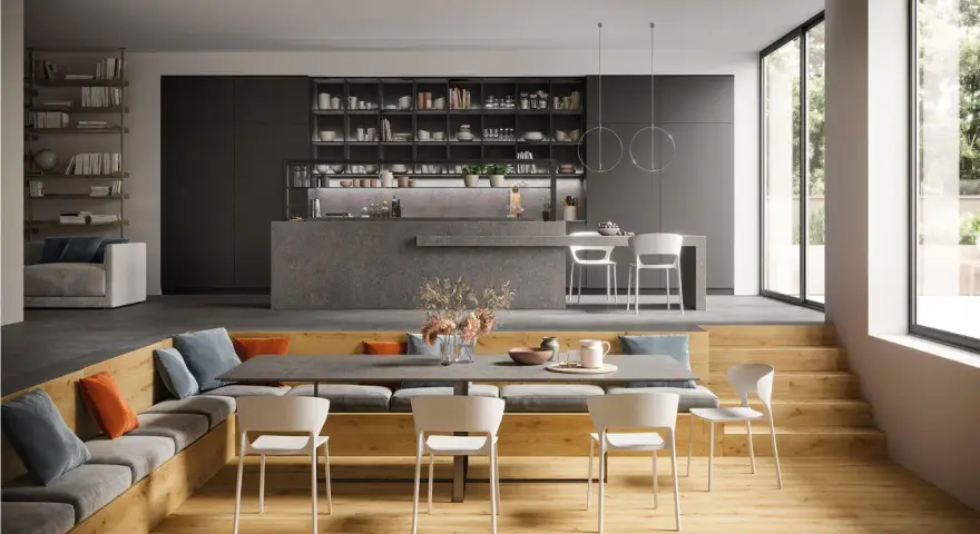 Aménagement moderne d'un salon salle à manger 12m2 avec banquette, table et cuisine ouverte.