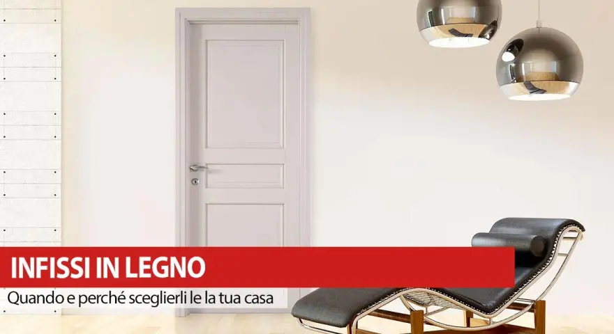 Infissi in legno: pro e contro per la tua casa. Porta bianca, chaise longue e lampade moderne in un ambiente luminoso.