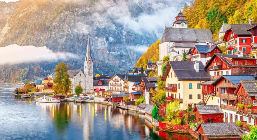 Scenic Hallstatt, Austria, a picturesque village nestled by a lake, perfect for a train journey from Prague.