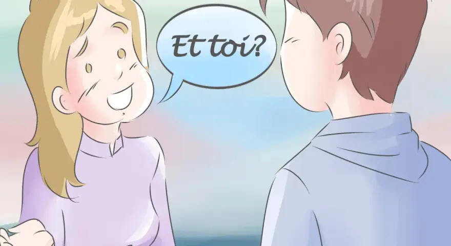 Una chica sonriente pregunta "¿Y tú?" en un globo de diálogo, como en un saludo en francés por email.