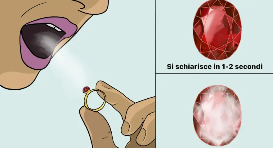 Anello con pietra colore rubino, soffiata si schiarisce subito. Altra pietra rimane appannata.