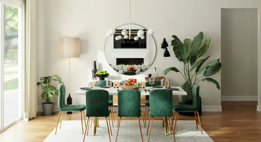 Une arche élégante sépare le salon de la salle à manger, révélant une table dressée avec des chaises en velours vert émeraude.
