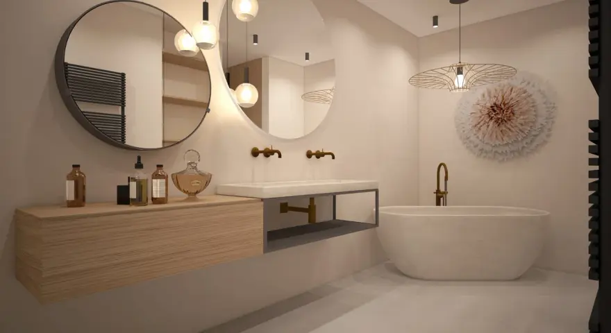 Salle de bain épurée avec baignoire îlot, double vasque et mobilier bois. Une vision de la tendance salle de bain 2026.