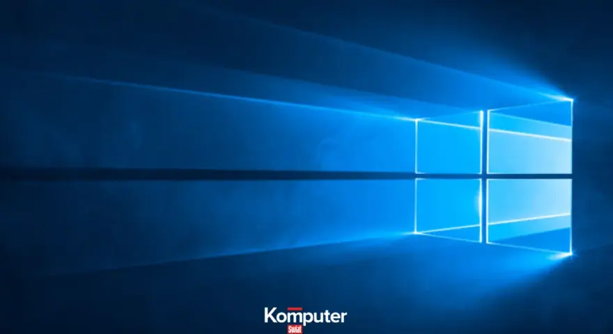 Niebieskie tło z logo Windows. Dowiedz się, jak wyłączyć laptopa, aby bezpiecznie zakończyć pracę.