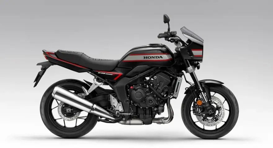 Czarny motocykl Honda CBR 1000F z czerwonymi i srebrnymi akcentami, gotowy na przygodę.