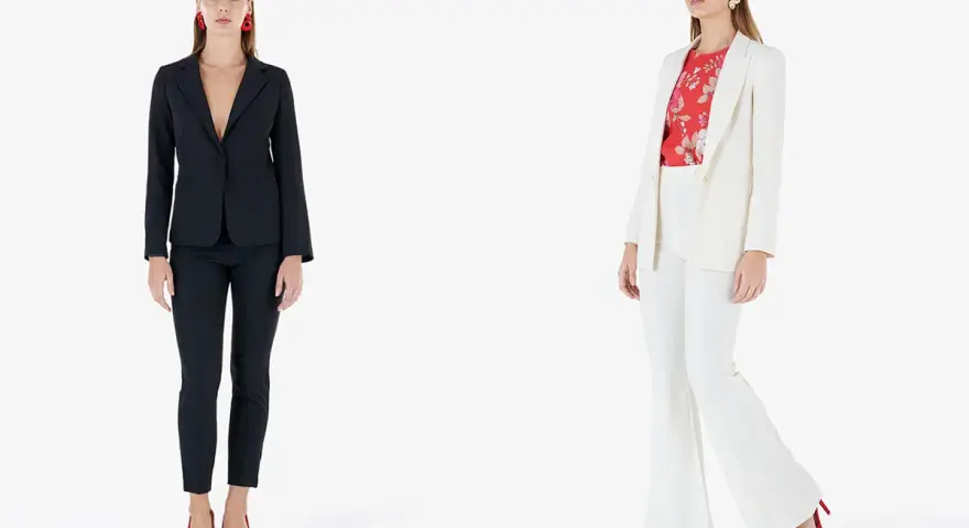Donna con giacca aperta o chiusa: un completo nero elegante e un tailleur bianco con camicetta a fiori.