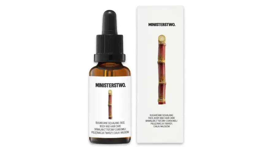 Buteleczka z serum i opakowanie z trzciną cukrową.