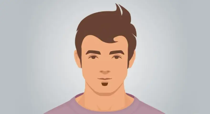 Un hombre con un peinado moderno y una barba mosca.