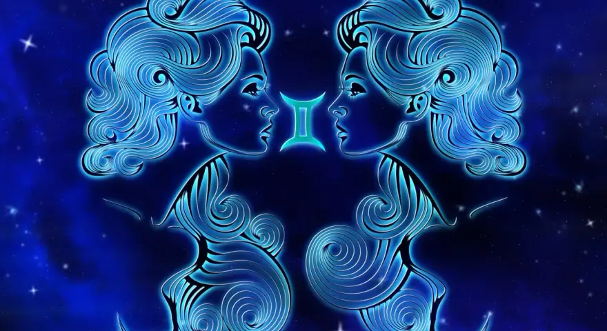 Dwie stylizowane głowy patrzą na siebie, symbolizując gemini znak zodiaku. Neonowe linie tworzą ich rysy na tle nocnego nieba.