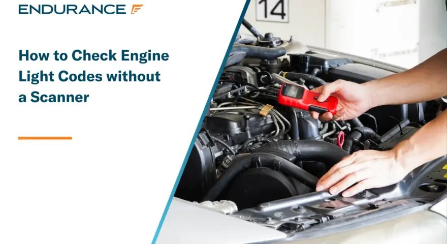 Learn how to read engine codes without a scanner. A person holds a red diagnostic tool near a car's engine.