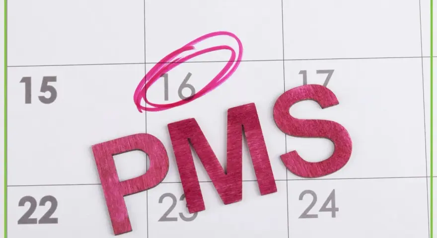 Litery "PMS" na kalendarzu. Dzień 16 zaznaczony kółkiem. Czy to objawy zagnieżdżenia zarodka?