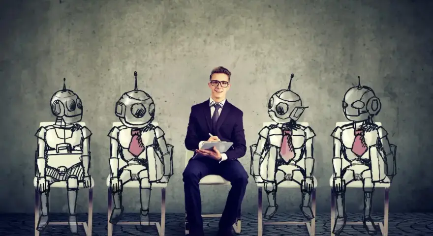 Młody człowiek w garniturze siedzi pośrodku rzędu robotów, przygotowując się do rozmowy kwalifikacyjnej. To wizja przyszłości i zawody przyszłości.
