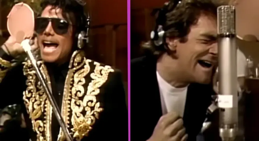 Michael Jackson i Lionel Richie śpiewają w studiu nagraniowym, tworząc razem "We are the world".