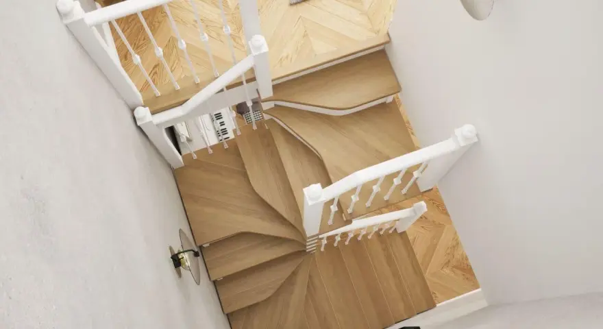 Eleganckie klatki schodowe w domu, z białymi balustradami i drewnianymi stopniami, tworzą stylową przestrzeń.