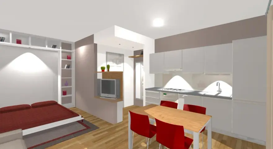 Pianta di un monolocale di 30 mq: letto, libreria, cucina moderna e tavolo con sedie rosse.