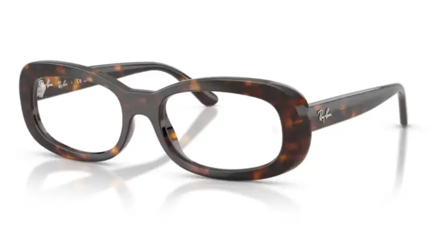 Okulary Ray-Ban w panterkę z uszkodzonym antyrefleksem na soczewce.