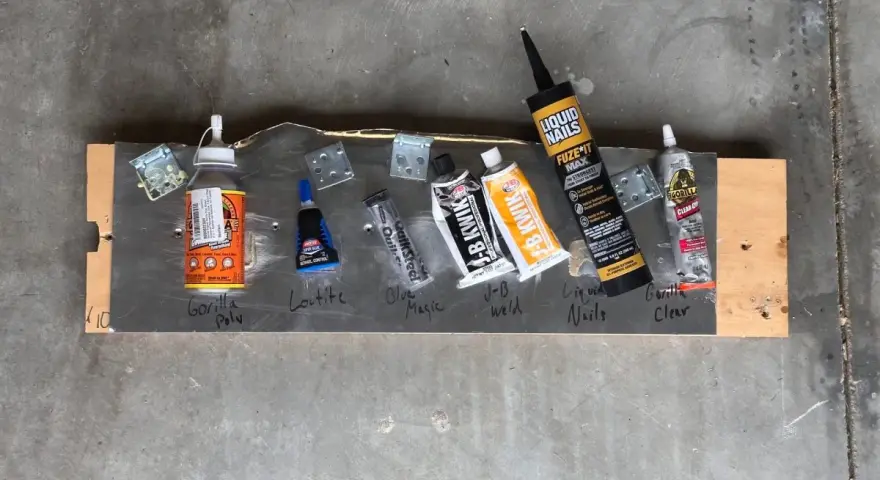 Adhesives are laid out on a board, including Gorilla Poly, Loctite, and Gorilla Clear, to test if Gorilla Glue works on resin.