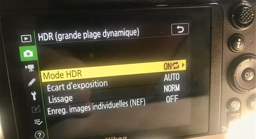 Menu d'un appareil photo Nikon affichant les options HDR pour une meilleure gestion de l'éclairage.