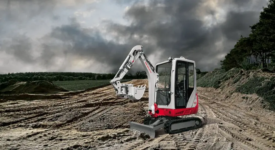 Mini koparka Takeuchi TB216 na budowie, gotowa do pracy. Sprawdź Takeuchi TB216 dane techniczne.