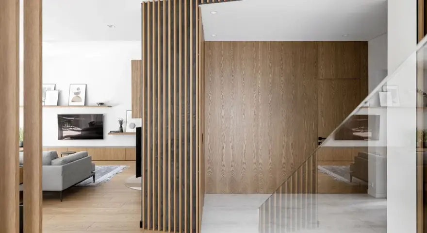Interno di una casa stile nordico moderno, con pareti in legno, divisori a listelli e arredi minimalisti.