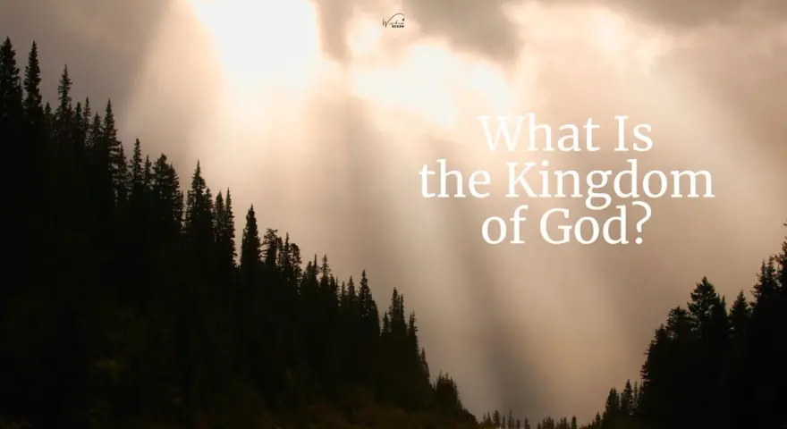 Sunlight streams through clouds over a dark forest, illuminating the question: "What Is the Kingdom of God?