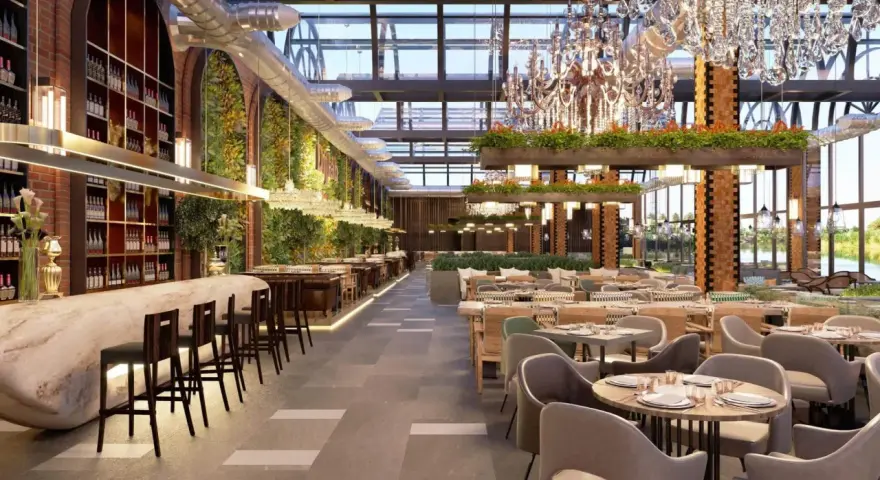 Interior de restaurante moderno con bar, mesas y vegetación. Un lugar elegante para pensar cuanto cuesta abrir un restaurante.