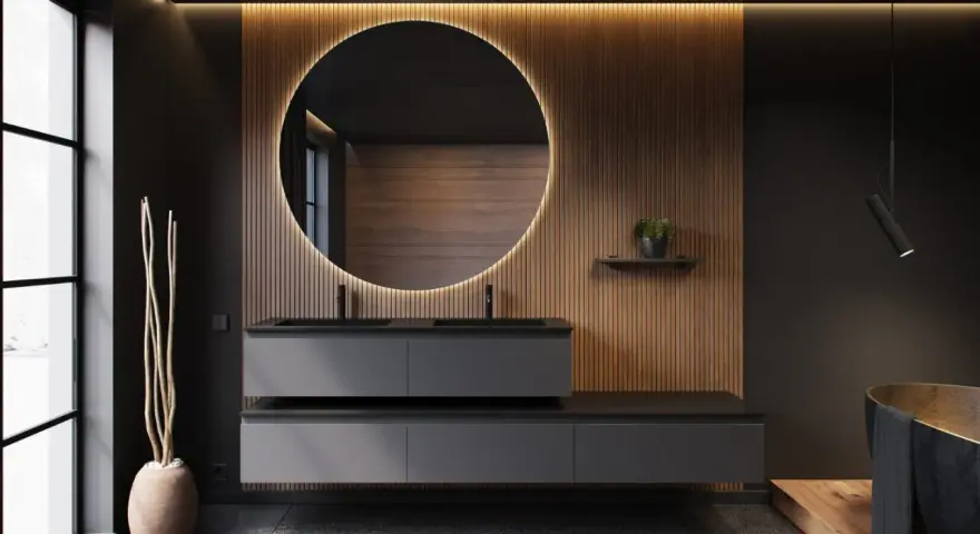 Élégante salle de bain style japonais avec double vasque, miroir rond lumineux et boiseries chaleureuses.