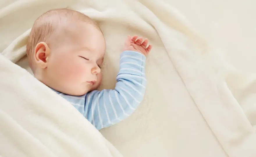 Rozwój niemowlęcia w 22. tygodniu - normy, sen i sygnały alarmowe