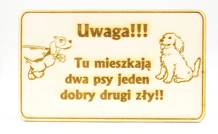 Tabliczka ostrzegawcza pies: jak prawidłowo oznakować posesję ze zwierzęciem