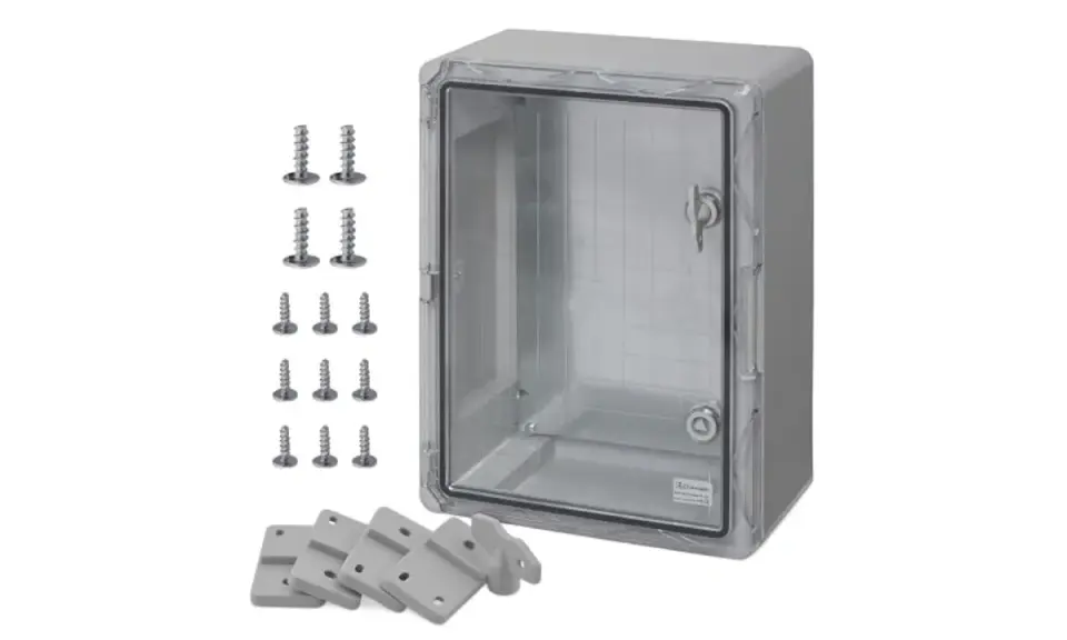 Coffret PVC transparent avec porte verrouillable, accompagné de vis et de supports de fixation. Idéal pour protéger vos équipements.