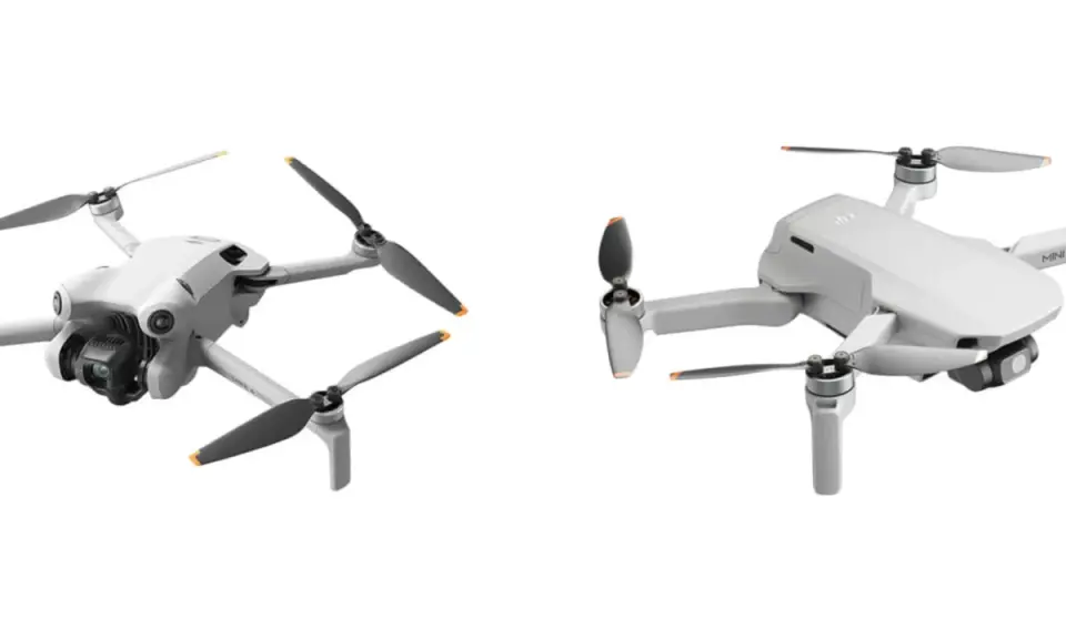 Dwa białe drony, jeden z przodu z kamerą, drugi z boku. Dron zasięg 10km, idealny do podniebnych podróży.