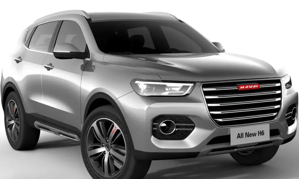 Srebrny SUV Haval H6 z nowoczesnym grillem i światłami LED.