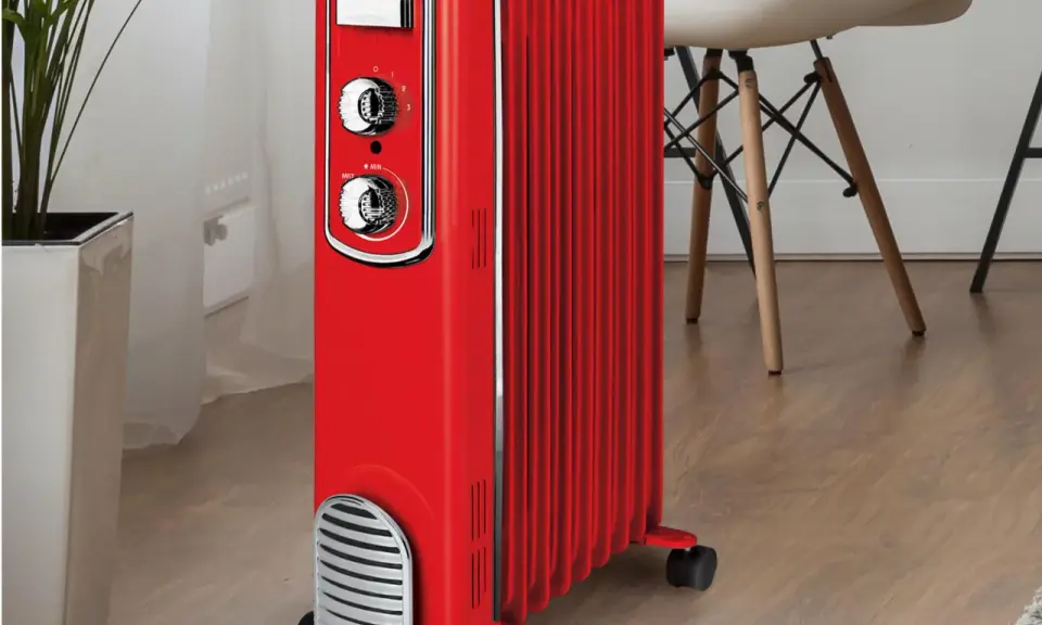 Chauffage d'appoint Thomson rouge, style rétro, avec molettes de réglage. Le meilleur chauffage d'appoint pour une ambiance cosy.