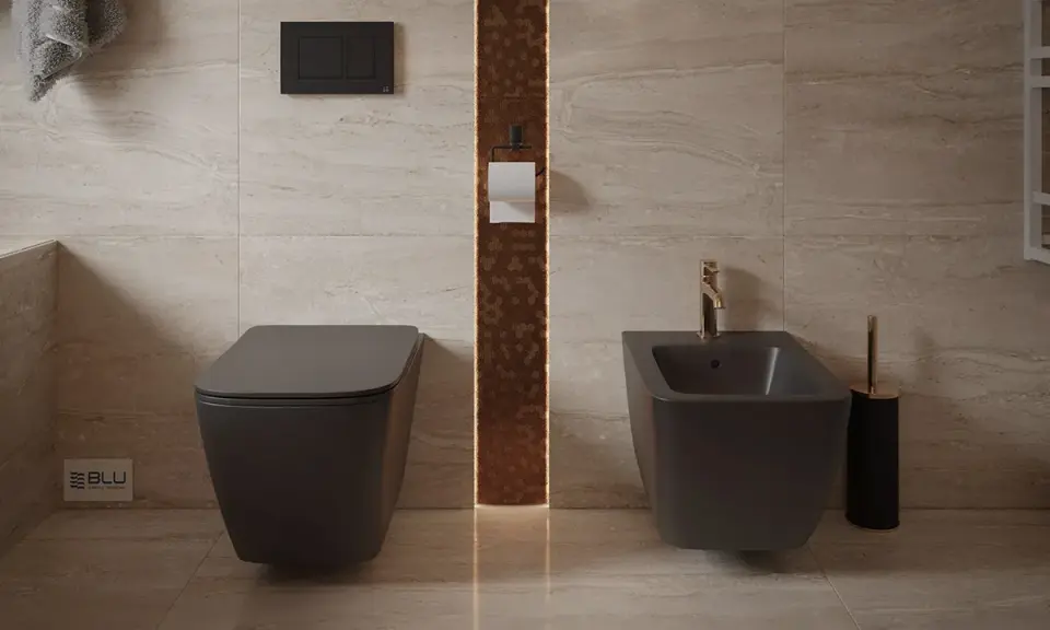 Nowoczesna łazienka z podwieszanym WC i bidetem. Dowiedz się, jak siadać na bidet, by higiena była komfortowa.