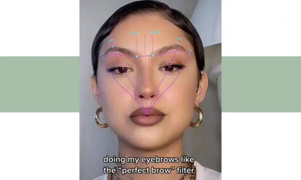 Une femme utilise un filtre pour redessiner son sourcil coupé, cherchant la perfection.