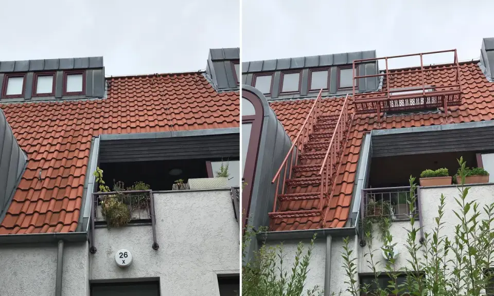 Rote Metalltreppe führt zu einem Dachfenster. Dies ist der 2. Rettungsweg für das Einfamilienhaus.