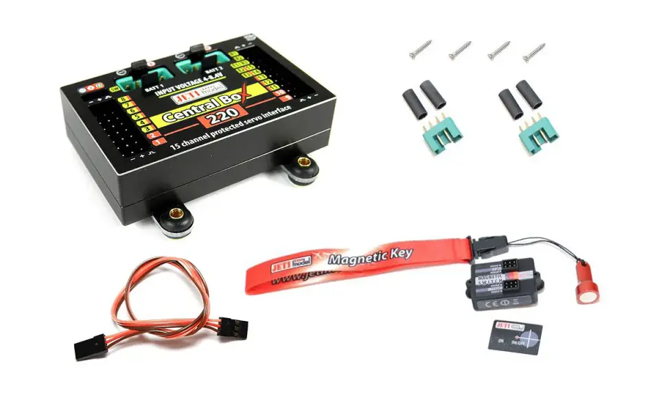 Jeti Central Box 220 mit Zubehör: Servoschnittstelle, Magnetic Key, Kabel und Schrauben.