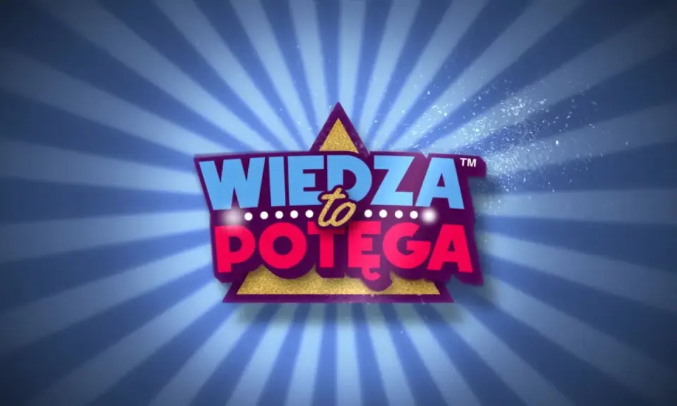 Logo "Wiedza to potęga" w jaskrawych kolorach, z błyszczącym złotym trójkątem i promieniami w tle. Prawdziwa wiedza to potęga, nawet na PS5!