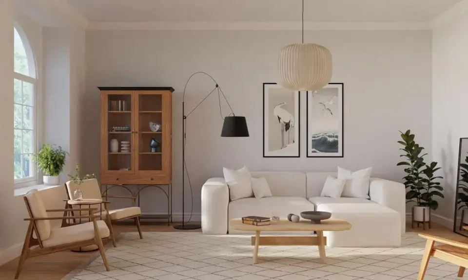 Ein Wohnzimmer im skandinavischen Design-Stil mit beiger Couch, Holzboden und einem Schrank.