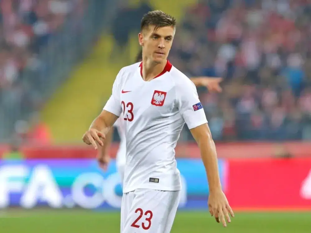 Piątek wzrost: Jak wysokość Krzysztofa Piątka wpływa na jego grę?