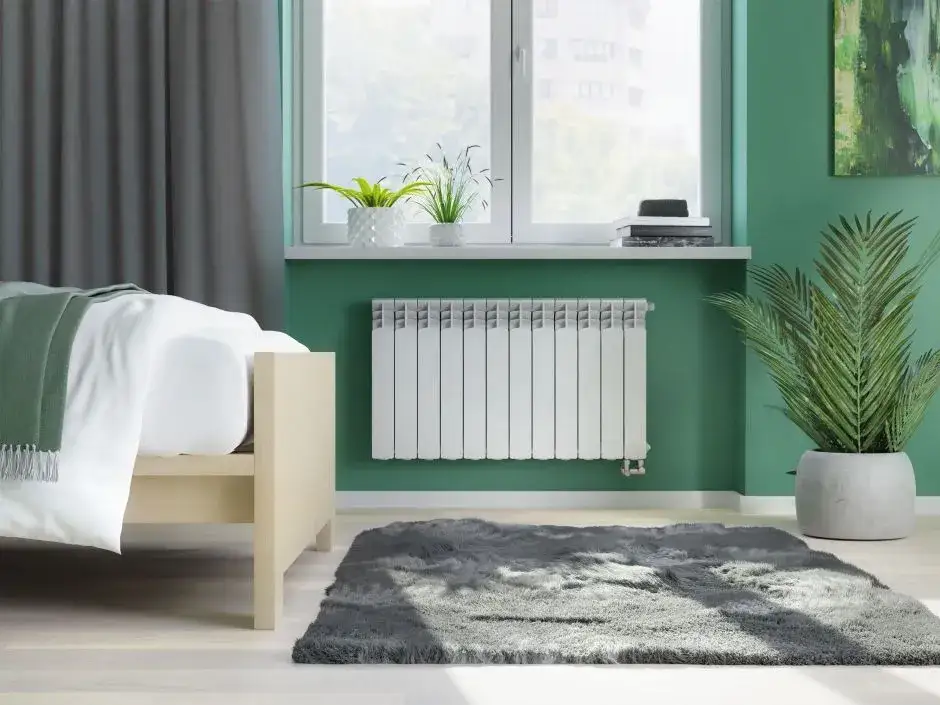 Jakie grzejniki do mieszkania w bloku wybrać, aby zaoszczędzić?
