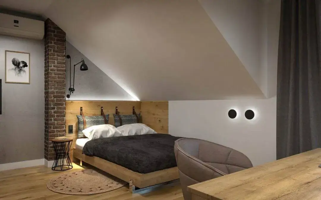 Pokój na poddaszu ze skosami: Jak urządzić funkcjonalne i stylowe wnętrze?