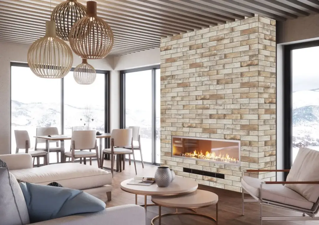 Jak estetycznie i bezpiecznie obłożyć komin w salonie – najlepsze materiały i porady