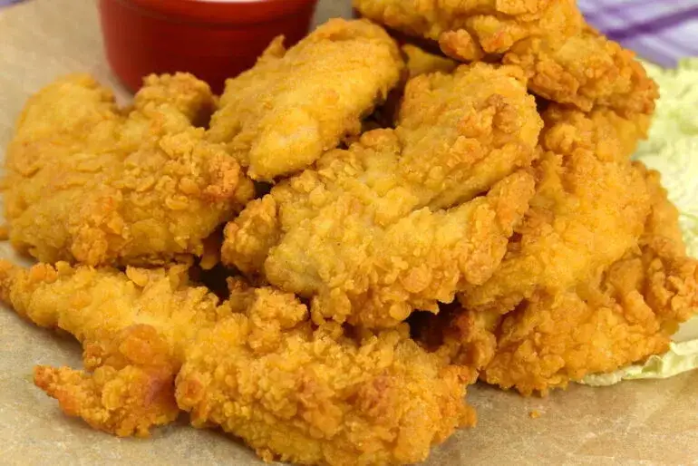 Pyszne polędwiczki drobiowe przepis na soczyste kąski w panierce