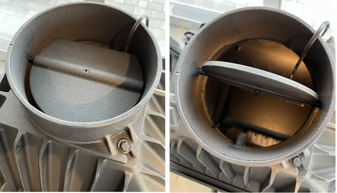 Dwa zbliżenia metalowego wkładu kominowego z klapą regulacyjną.