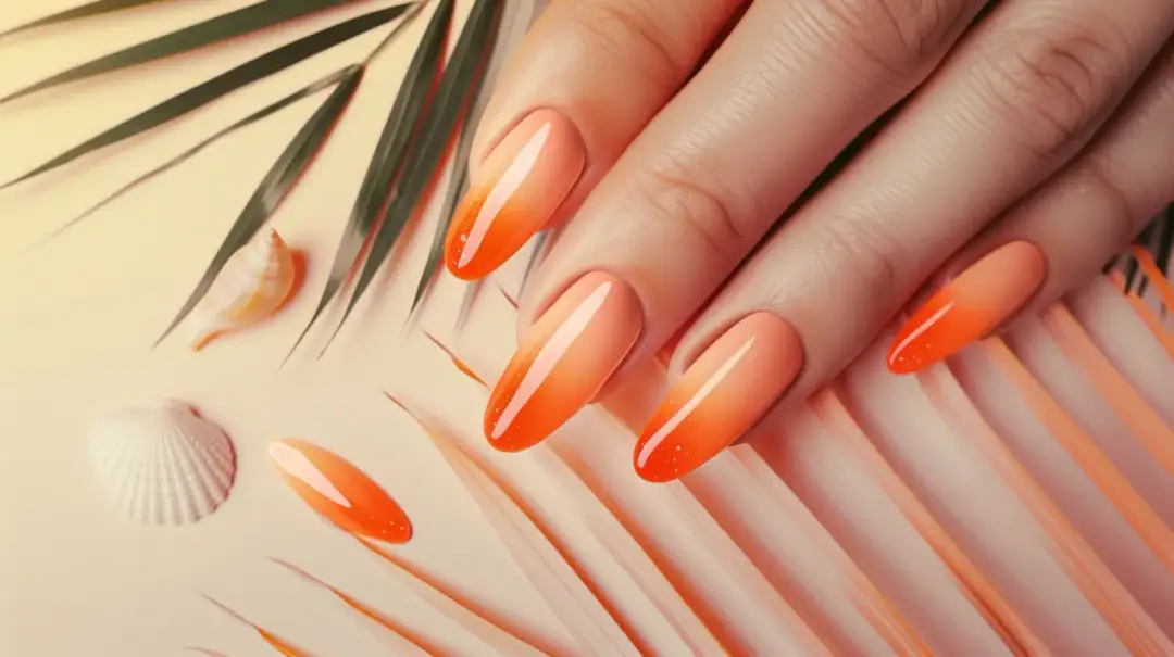 Inspiracje pomarańczowym ombre na Twoich paznokciach - świeży wygląd na lato