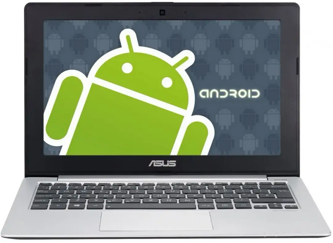 Laptop Asus z logo Android na ekranie. Tło ekranu wypełnione jest powtarzającymi się ikonami robota Android.