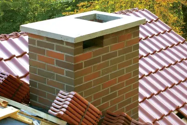Jak ocieplić komin z cegły, aby uniknąć strat ciepła i kosztów