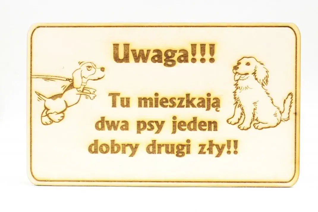 Tabliczka ostrzegawcza pies: jak prawidłowo oznakować posesję ze zwierzęciem